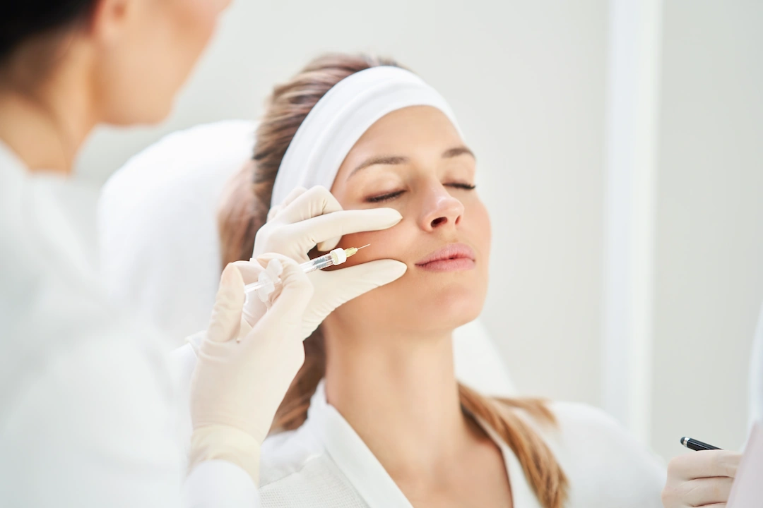 Woman getting Botox injected